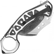 Experience style and precision with the Neptune Two-Tone Pocket Folding Karambit, showcasing a sleek black design. Elevate your collection with this versatile edged tool.